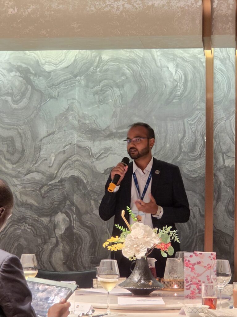 Anil Pradhan speaking about Young Tinker at the PBC Fellows dinner