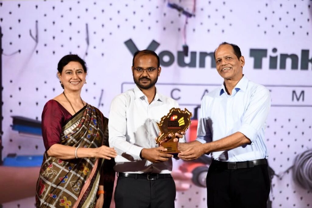 Anil Pradhan receiving the Youth Changemaker award at OTV Odisha Citizens Award 2026